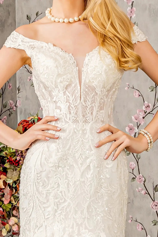 Front close-up upper view highlighting the intricate beaded embroidery, shimmering jewels, and sequins that adorn the translucent off-shoulder bodice and define the sweetheart neckline.