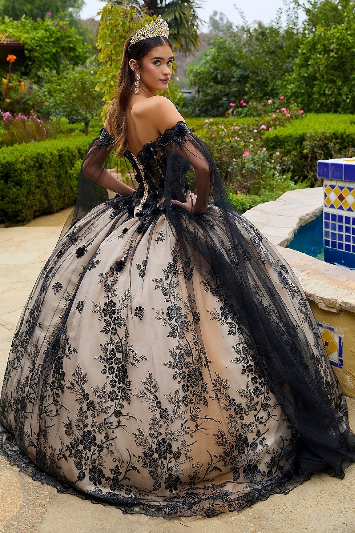 Quinceañera | Black Champagne 3D Floral Appliqué Glitter Pattern Embellished Mesh Sweet 15 Dress with Mesh Sleeves | Paiva dress back with tiara