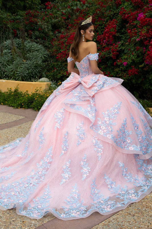 Blush quince Ball Gown with long train and layered ruffles and big bow