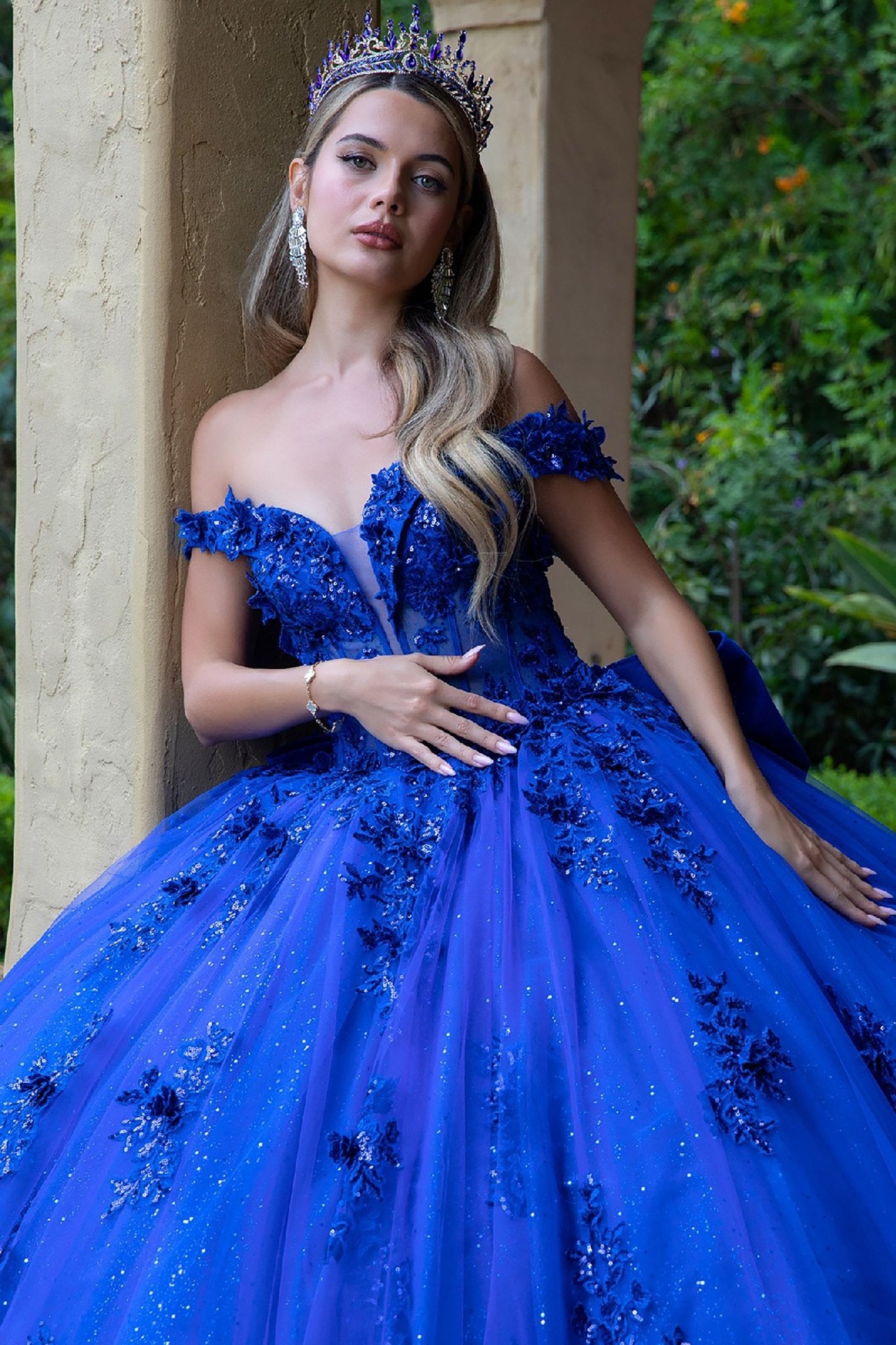 Quinceañera | Royal Blue Ball Gown with 3D Floral Appliques and Detachable Bow | Emelia dress front zoom