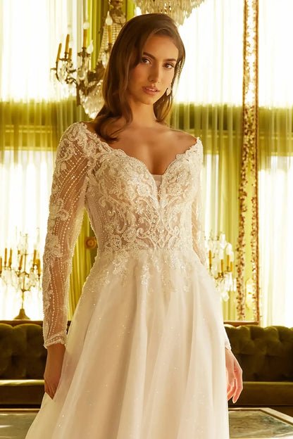 Front close-up upper view highlighting the intricate shimmering details on the long sleeves and the bold, clean lines of the wide plunging V-neckline.