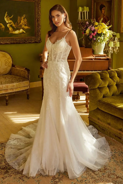 Full full-length view displaying the layered texture of the sequined embroidery and the graceful flow of the cape train from a lateral perspective.