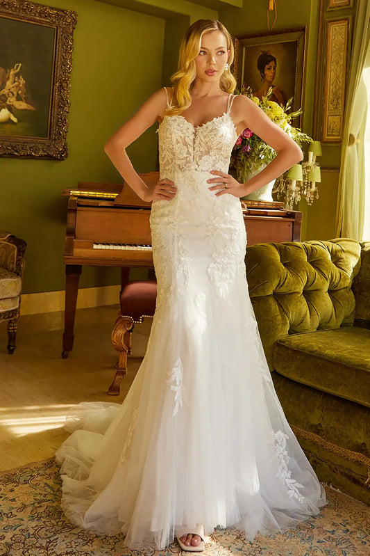 Front full-length view of an off-white trumpet wedding dress featuring a V-neckline corset bodice, double spaghetti straps, and all-over sequin embroidery.