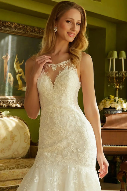 Front close-up upper view highlighting the intricate floral embroidery on the bodice and the delicate transparency of the illusion V-neckline.