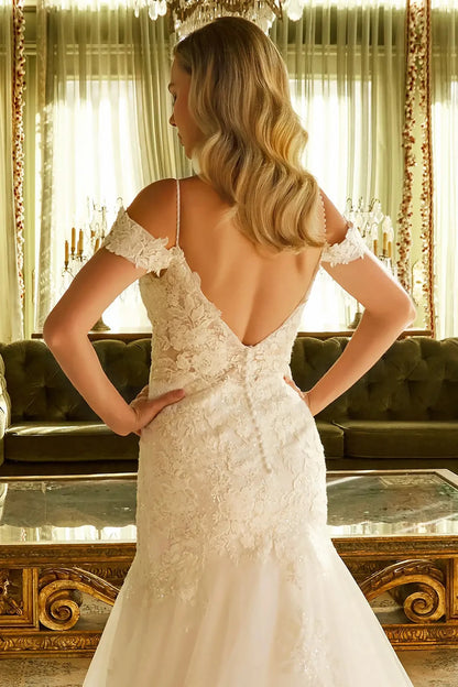 Back close-up upper view focusing on the deep V-back construction and the elegant row of decorative buttons concealing the central zipper.