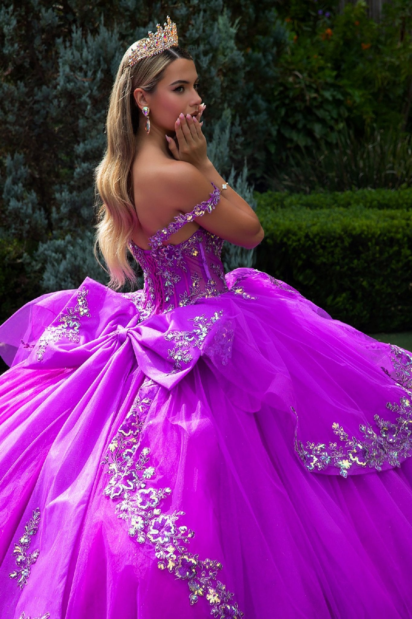 Girl wearing a Layered Ruffle Purple Ball Gown and Detachable Back Bow and Train 