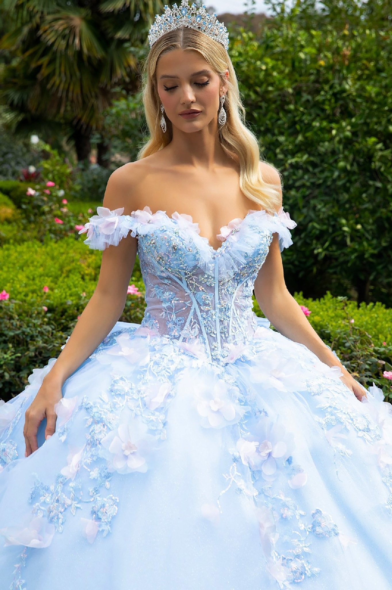 Quinceañera | Light Blue Ball Gown with 3D Flowers, Sheer Corset, Ruffles, and Detachable Bow | Ilsa dress front zoom