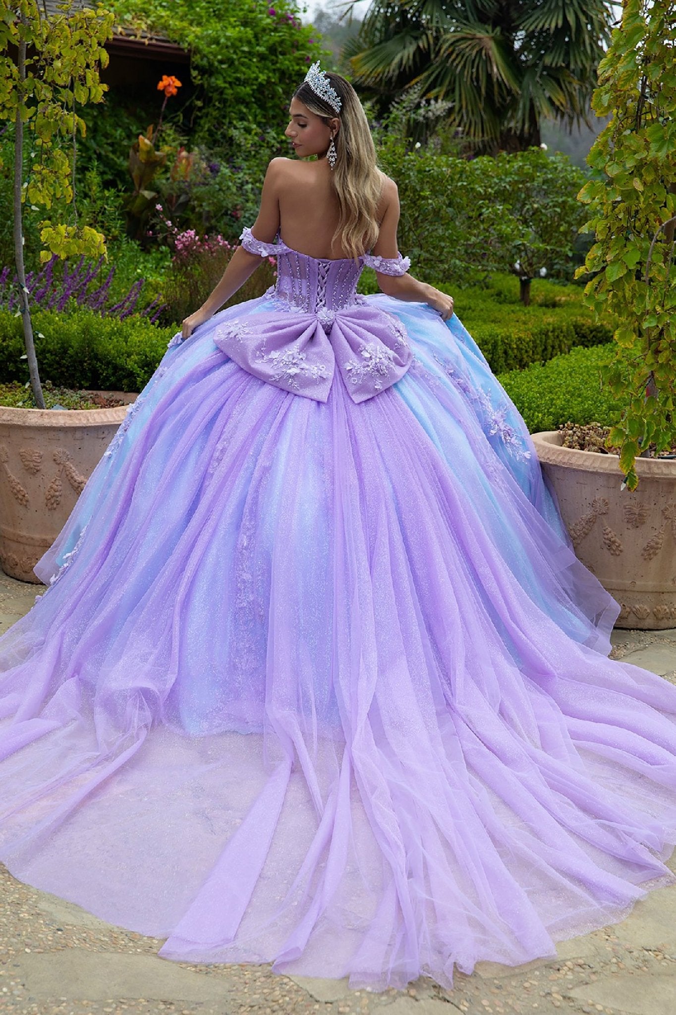 Quinceañera | Lilac-Blue Ball Gown with 3D Appliques, Corset Bodice, and Detachable Bow | Abril dress back