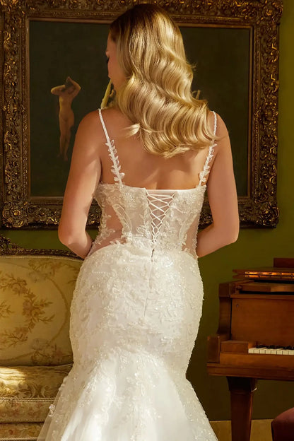 Back close-up upper view focusing on the traditional lace-up corset closure and the continuation of the beaded floral motifs along the rear waistline.