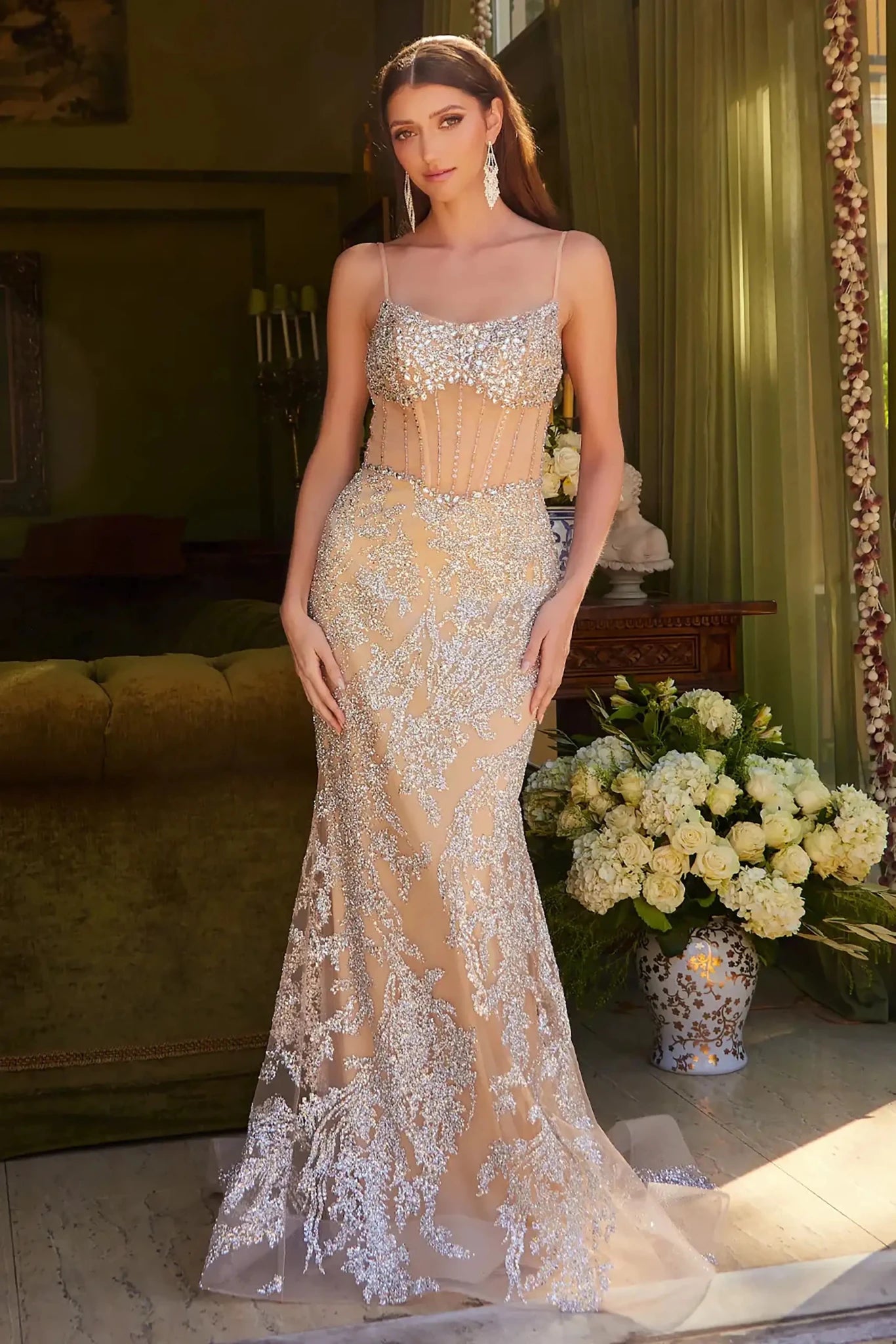 Front full-length view of a Champagne beaded mermaid prom dress with corset bodice and lace-up back