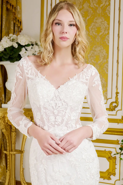 Woman wearing a white lace dress in an elegant interior setting