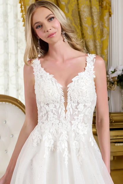 Woman wearing a wedding dress with a fitted V-neck bodice.