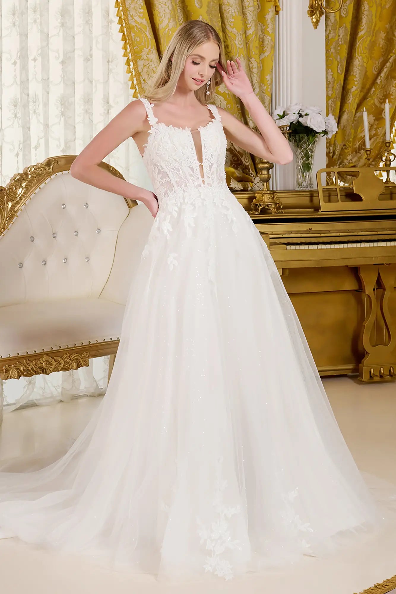 Woman wearing a A-line wedding gown with V-neck corset bodice