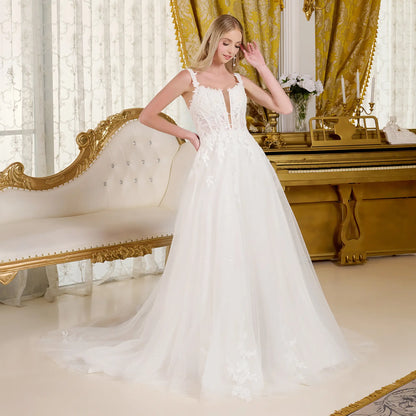 Woman in a wedding dress in an elegant gold and white decorative room