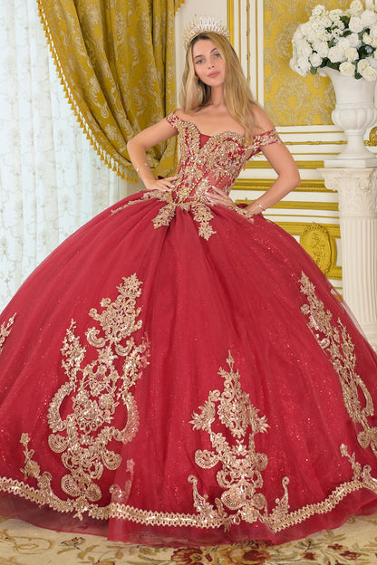 Burgundy quinceañera ball gown with off-the-shoulder corset bodice, gold embroidery and beadwork, full glitter tulle skirt, and elegant train in a luxury interior setting
