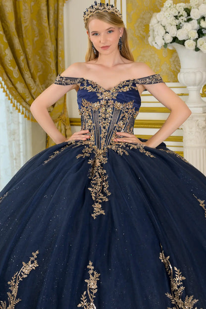Close-up front view of navy quinceañera ball gown highlighting gold embroidered corset bodice, off-the-shoulder neckline, structured boning, and glitter tulle skirt