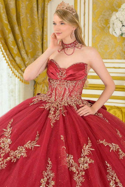 Close-up front view of burgundy quinceañera ball gown highlighting embroidered corset bodice, sweetheart neckline, structured boning, and glitter tulle skirt