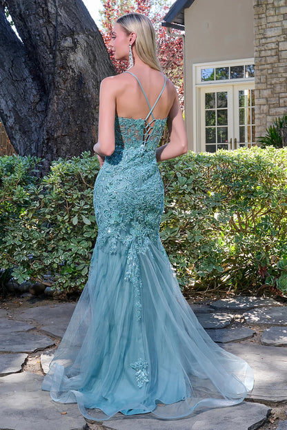 Back full-length view of a sage prom dress with a sheer V-neck corset bodice, spaghetti straps, beaded tulle fabric, and a floor-length trumpet silhouette.