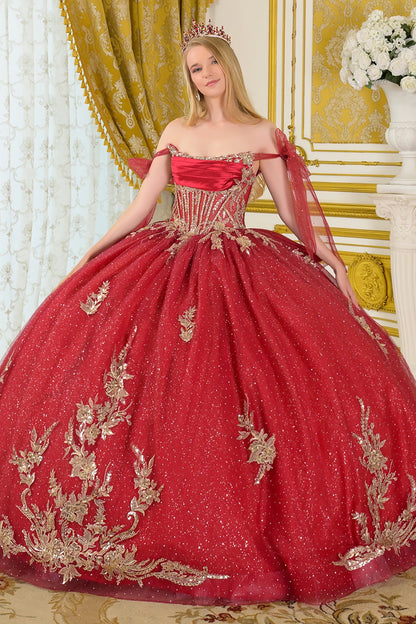 Girl wearing a red quinceañera dress with satin-decorated bodice, mesh ribbon sleeves, and overall sparkle with gold sequin embroidery.