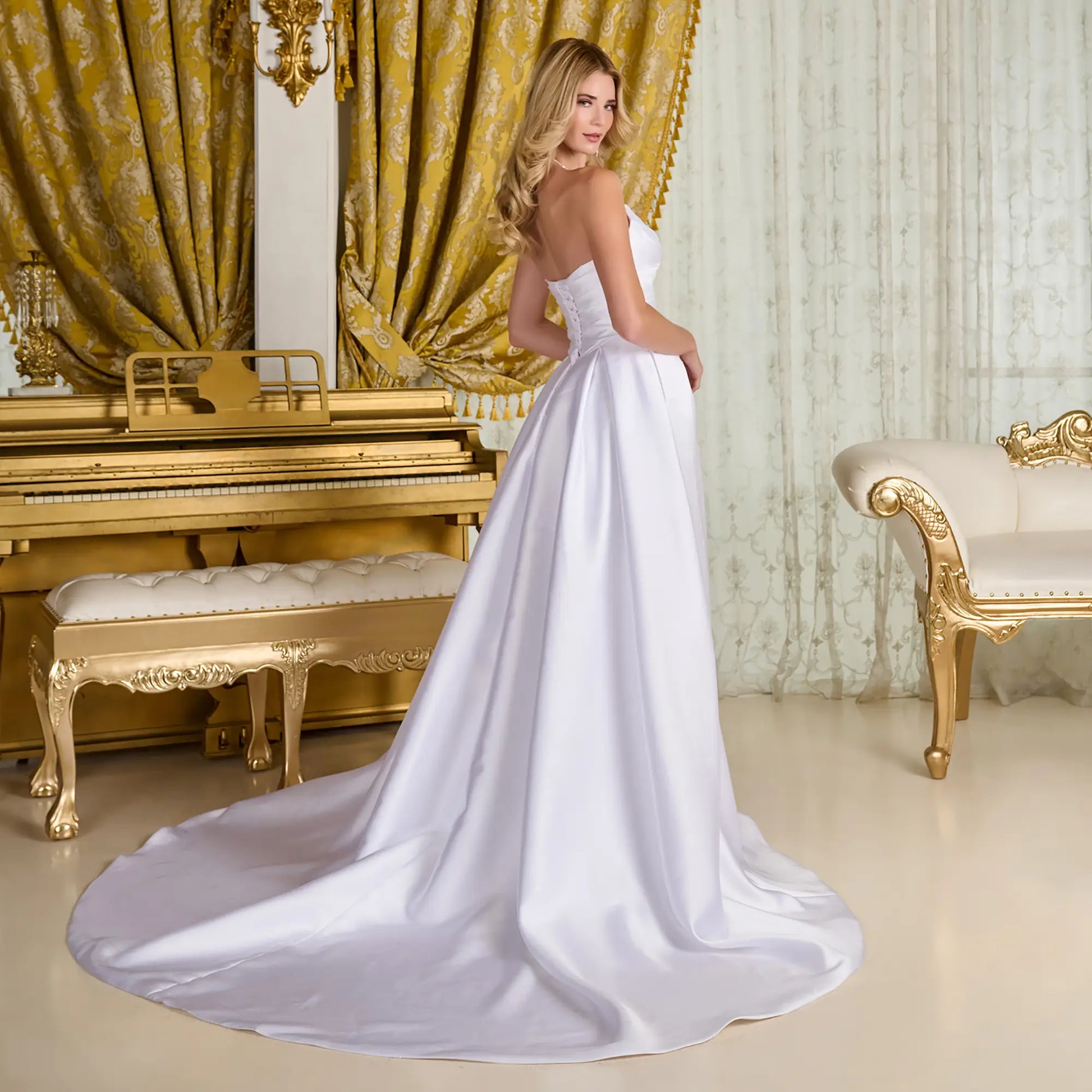 Elegant woman in a wedding gown in an opulent room
