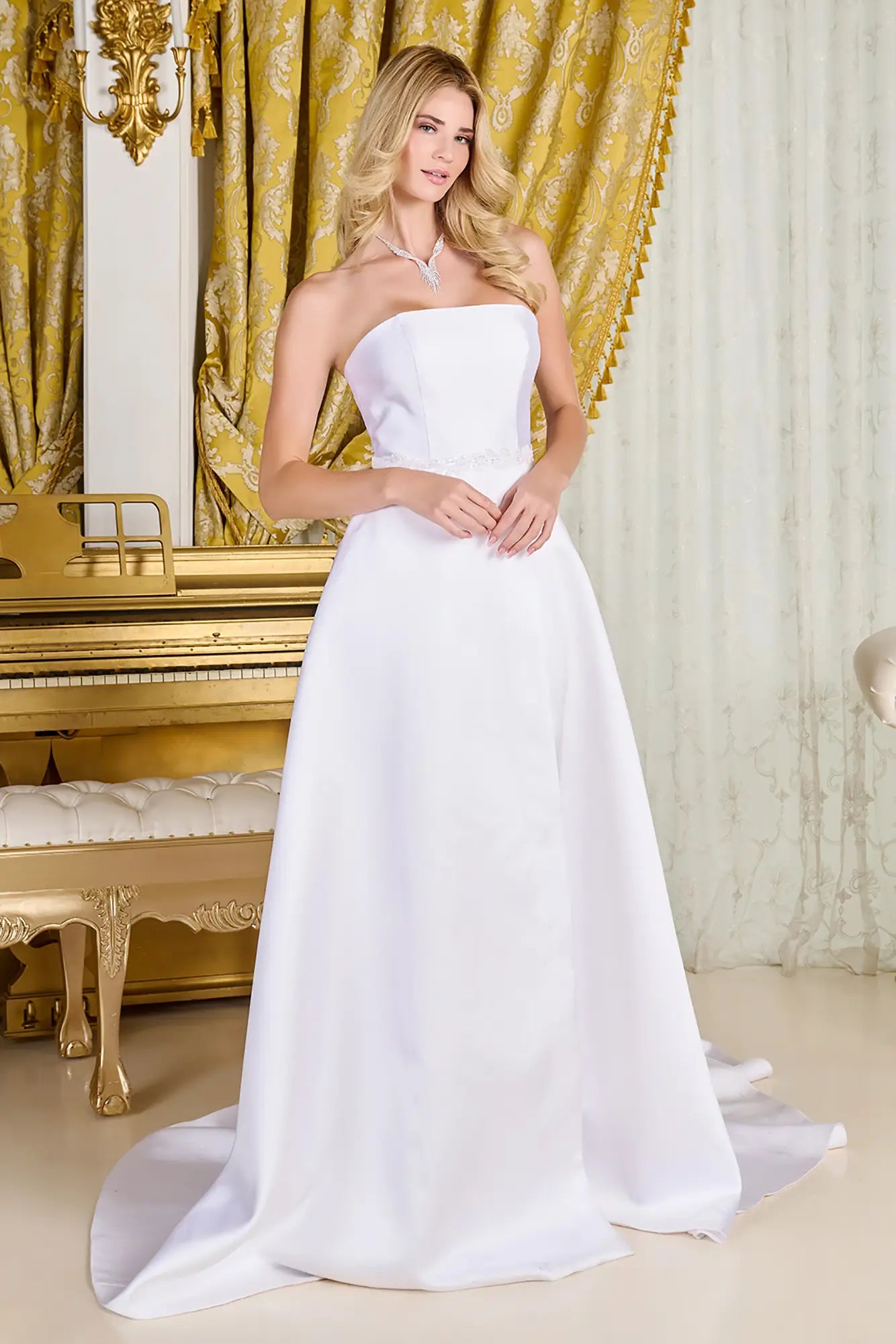 Woman wearing a wedding gown with strapless straight neckline