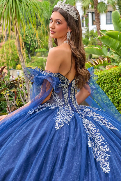 Navy quinceañera ball gown with lace-up back and beaded corset bodice, close-up back view outdoors