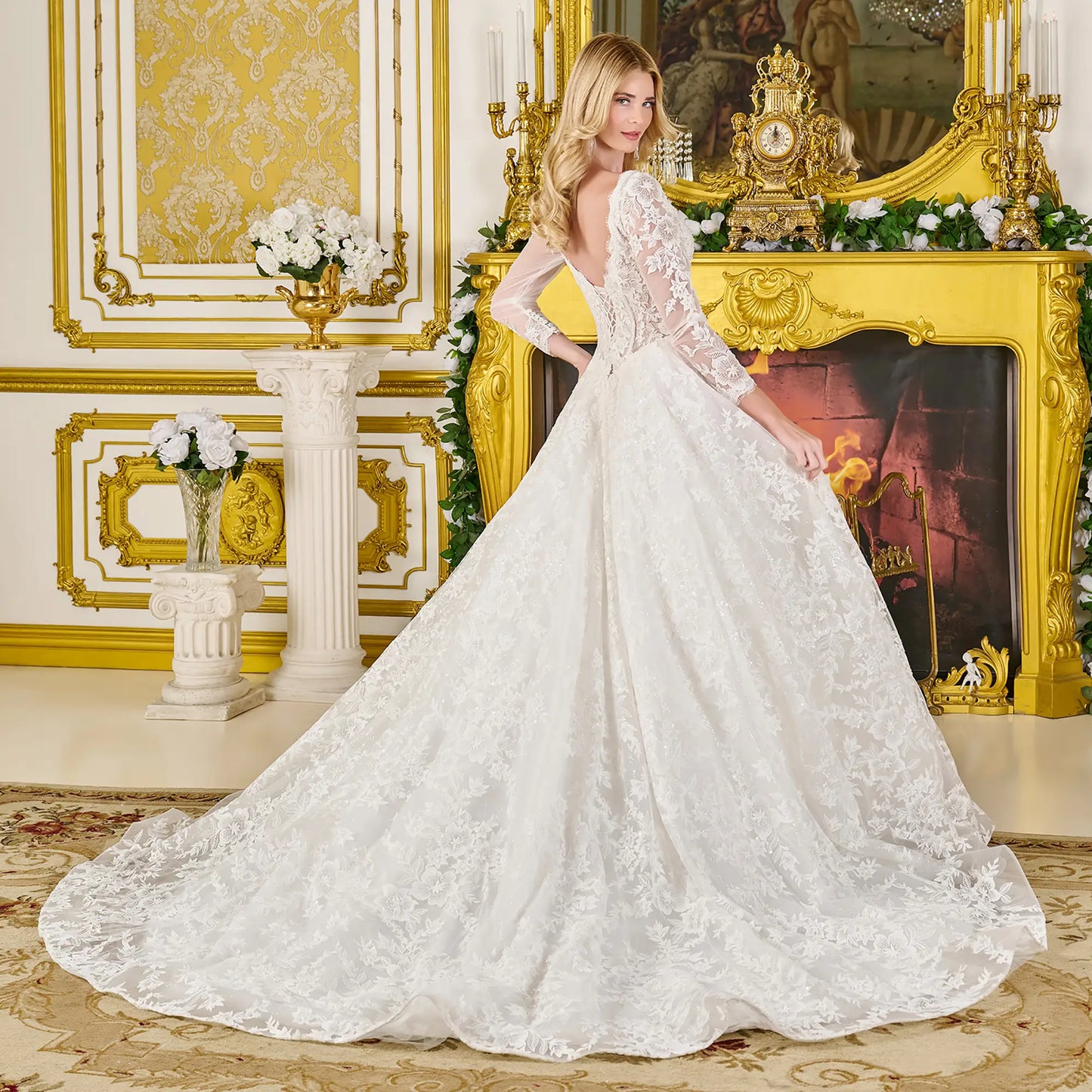 Woma wearing a wedding gown with structured corset bodice, glitter mesh underlayer, and graceful sweeping train