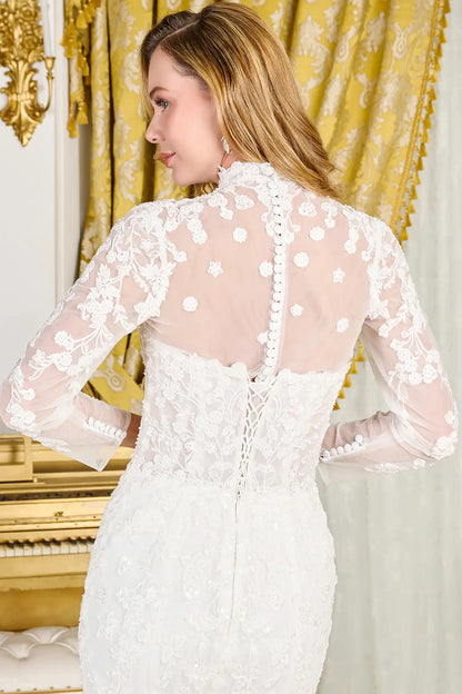 Woman wearing a white lace dress with a gold curtain background