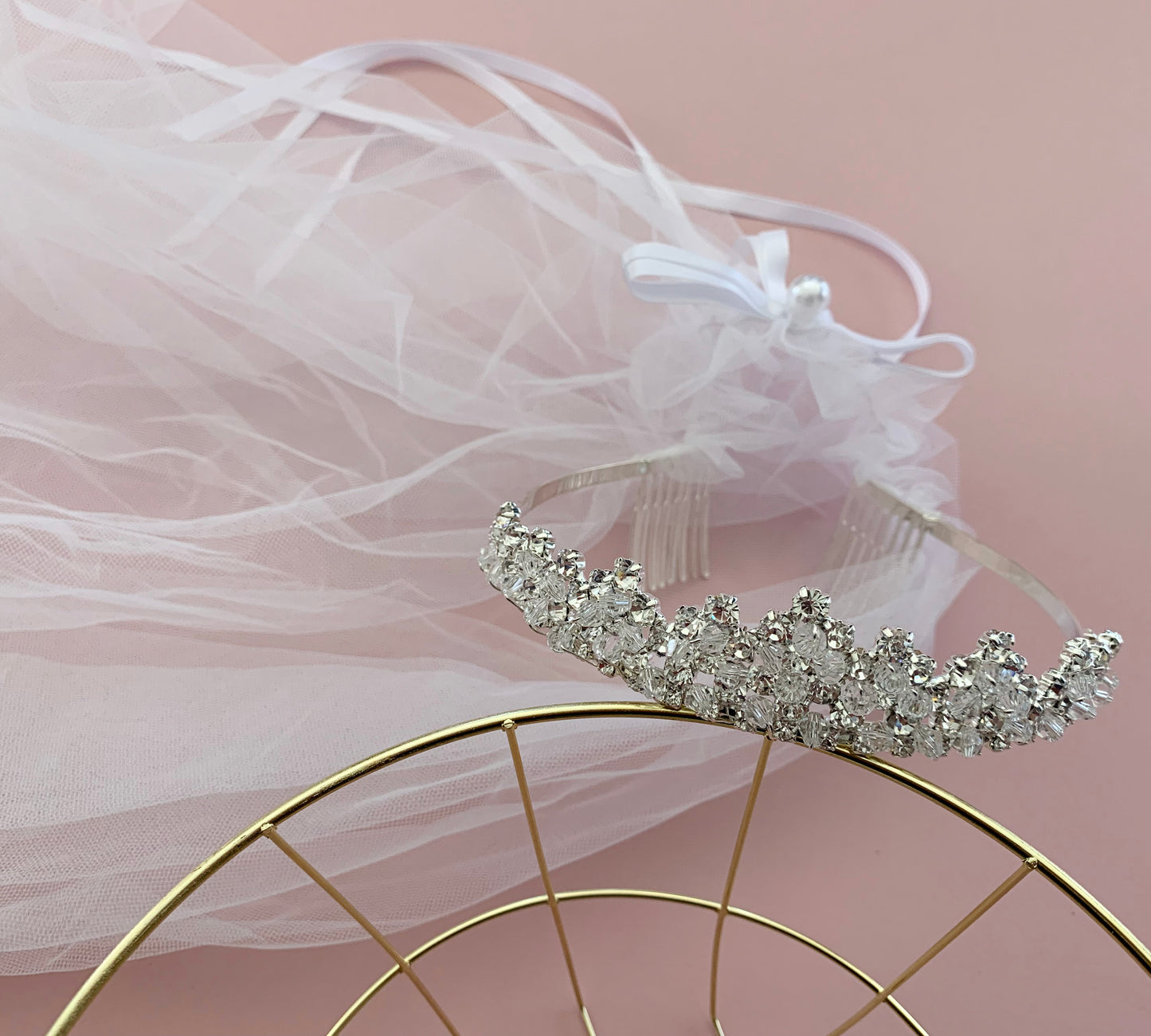 USA Made | Flower Girl Tiara Veil | Communion Rhinestone Tiara with 2-Tiered Veil - tiara veil resting on metal basket