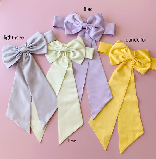 pastel ribbons on pink background  