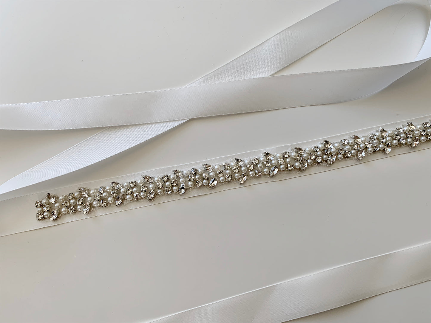 Handmade Beautiful Pearl and Rhinestone Sash Belt | Flower Girl Crystal Pearl Sash zoomed out view showing belt and embelishments