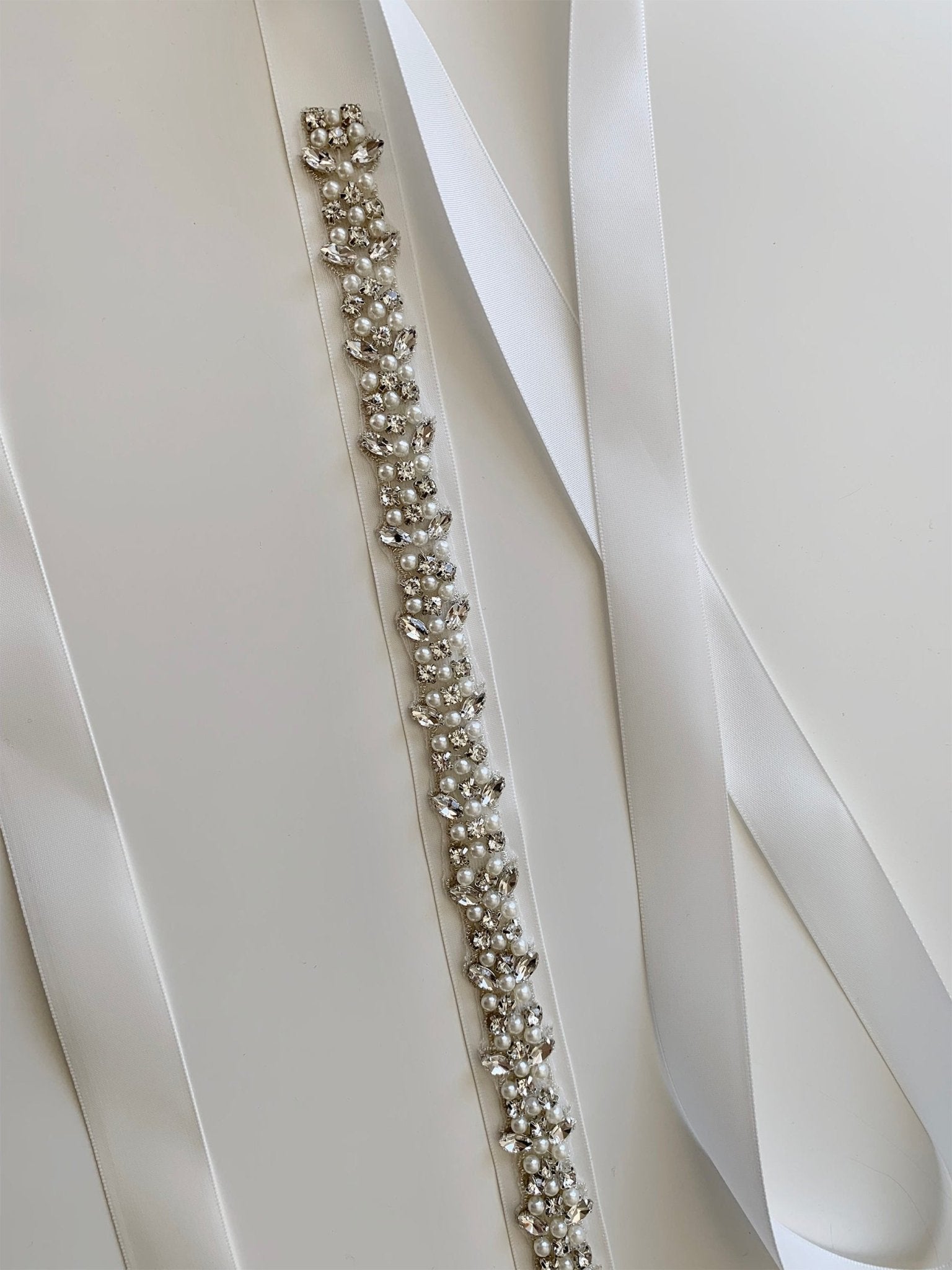 Handmade Beautiful Pearl and Rhinestone Sash Belt | Flower Girl Crystal Pearl Sash zoomed out view showing belt and embelishments