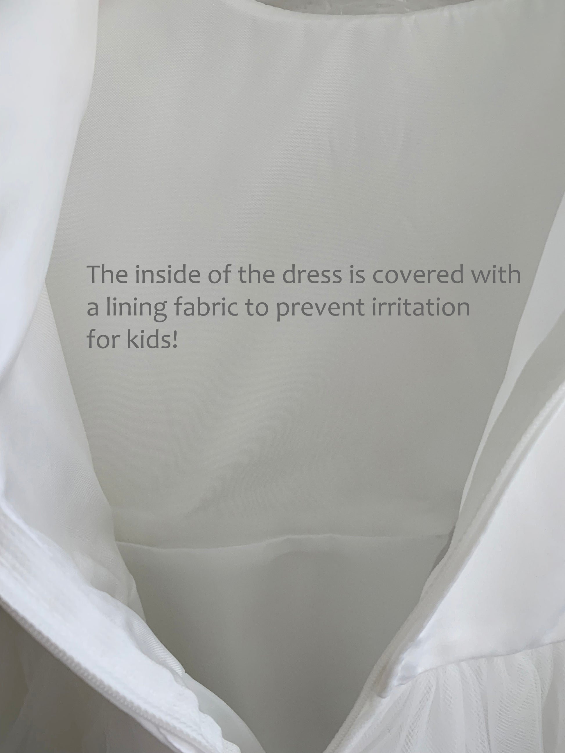 The inside of the dress is covered with a lining fabric to prevent irritation for kids!