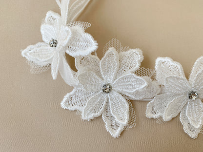 Handmade Baby Rhinestone Flower Off-white Headband - zoomed in view of flower pattern with jewel in middle of flower