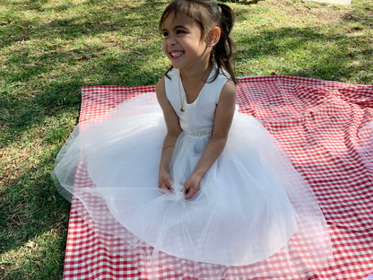 USA Made | Pearl and Rhinestone Light Ivory Flower Girl Dress | Classic Satin and Tulle Flower Girl Dress | Size 6M - Teen - girl wearing dress sitting on picnic blanket and smiling