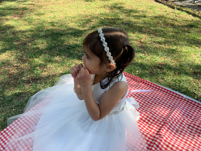 Handmade Rhinestone Flower Girl Headband - girl wearing headband sitting on picnic blanket