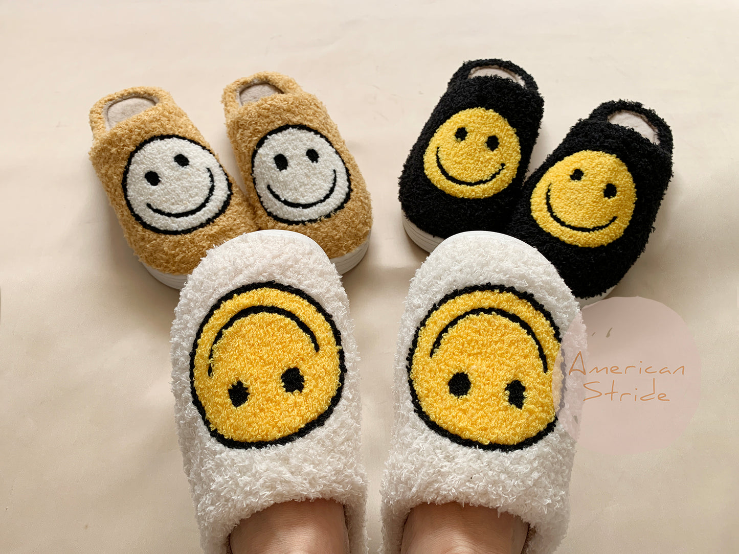 Cozy Fluffy Smile Face Slippers - a pair of feet inside a pair of slippers