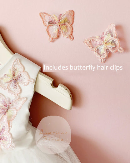 butterfly hair clips on a pink background
