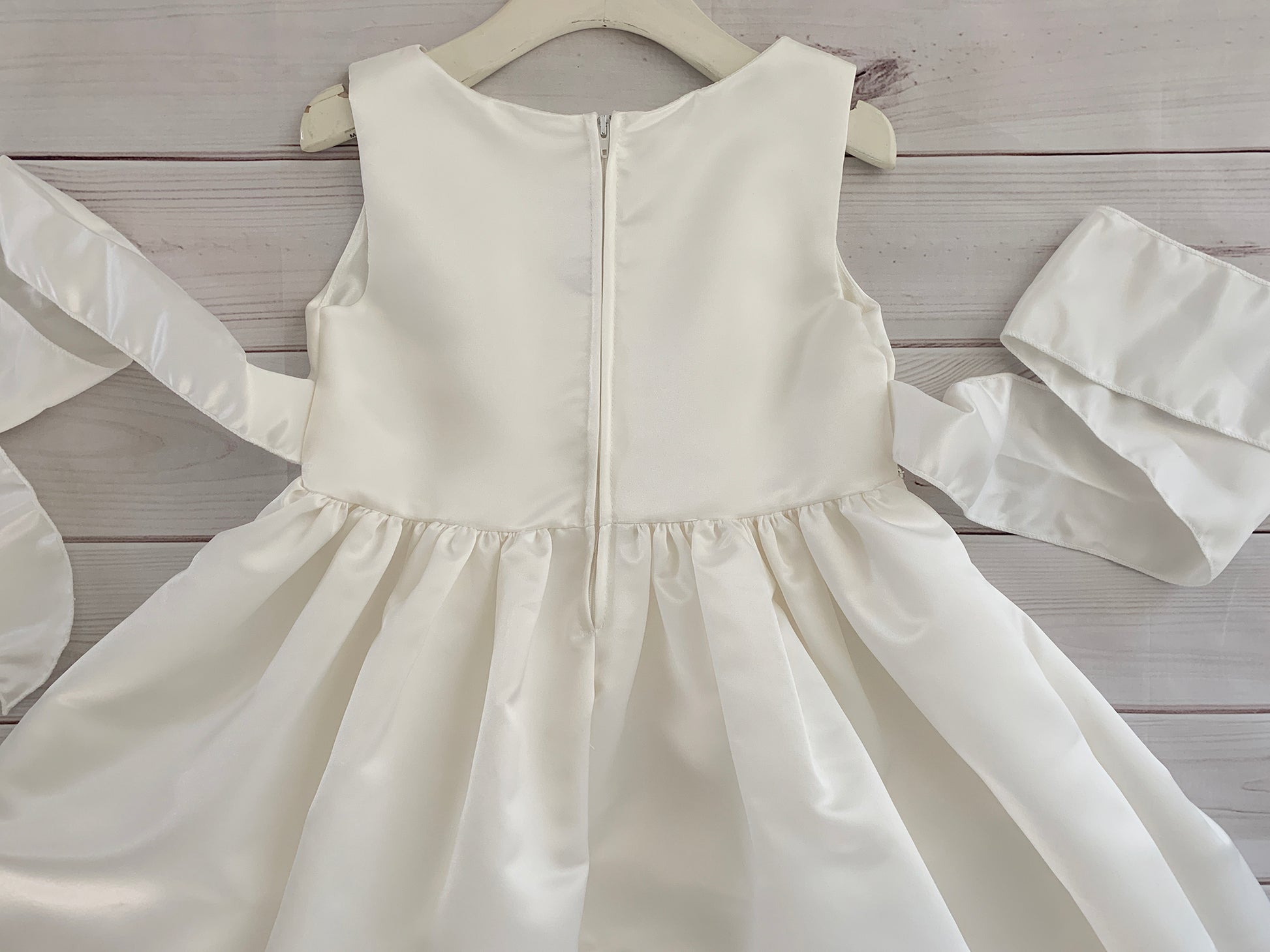 USA Made | Classic Dull Satin Dress with Attached Rhinestone/Pearl Detail | Flower Girl, Communion, Baptism Dress | Size 6M - Teen | Lynda dress A back zoom