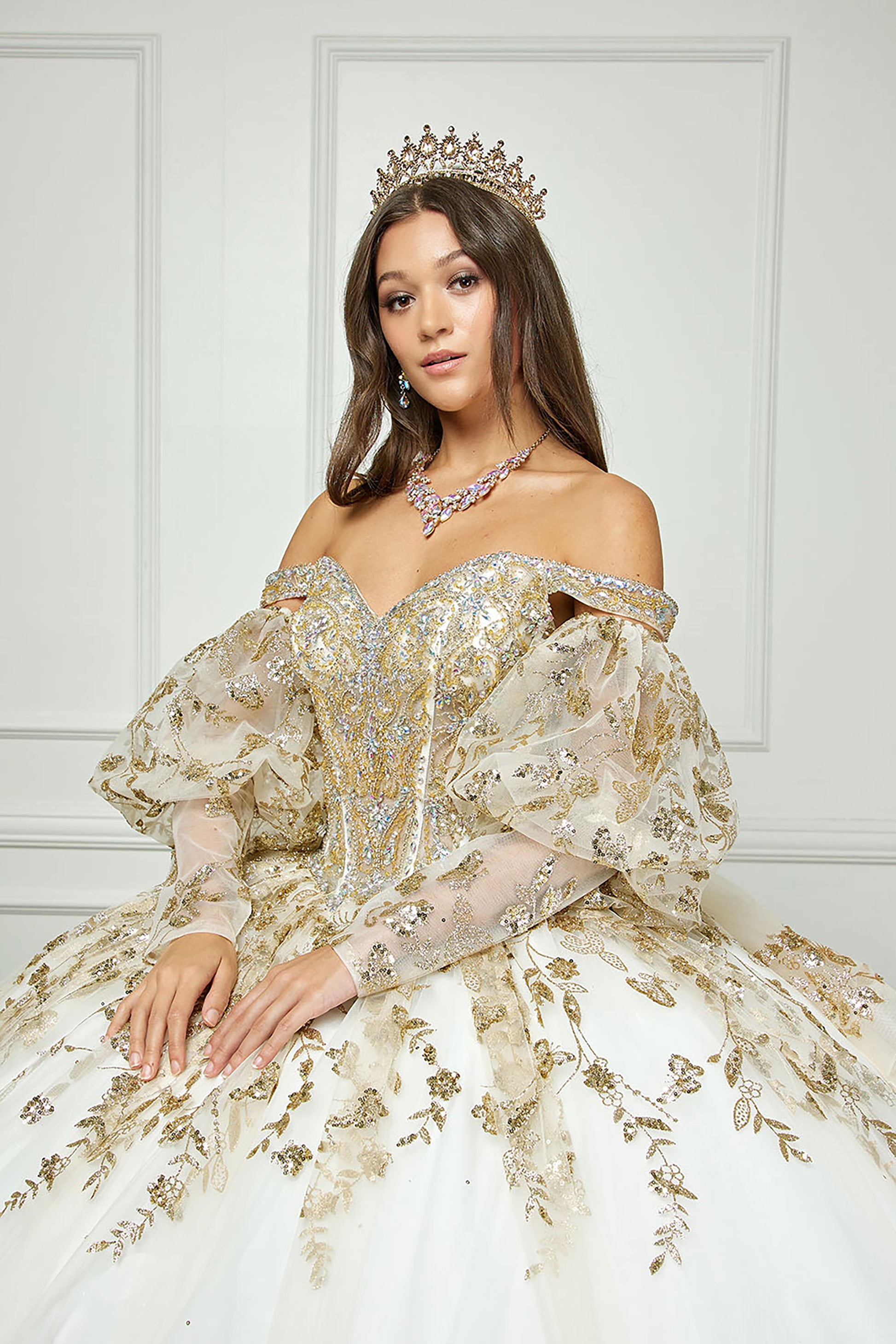 Ivory Gold Detachable Train With Stones and Gems See-through Bodice Quince Ball Gown front zoom with long sleeves