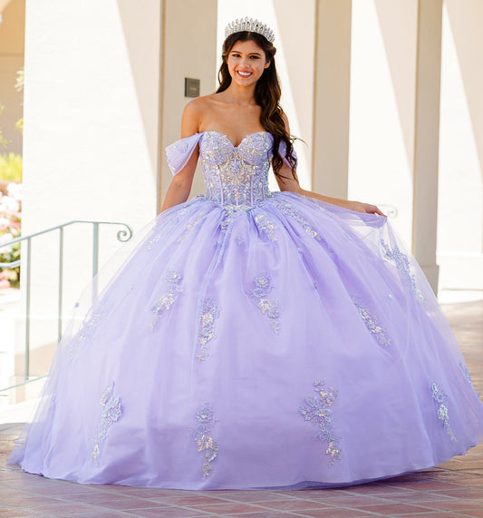 Quinceanera | Lilac Two-Tone See-Through Shimmering Sequins and 3D flowers Bodice Ballgown - front view of woman wearing dress smiling into camera