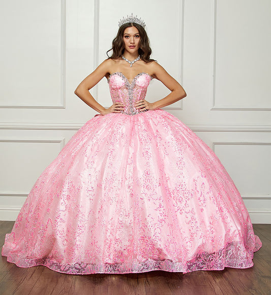 Pink Quinceanera | Spackly Sequins and Embellishments See-through Corset Bodice adorned with Shimmering Gems Quince Ballgown - front view of woman wearing dress and crown with hands on hips