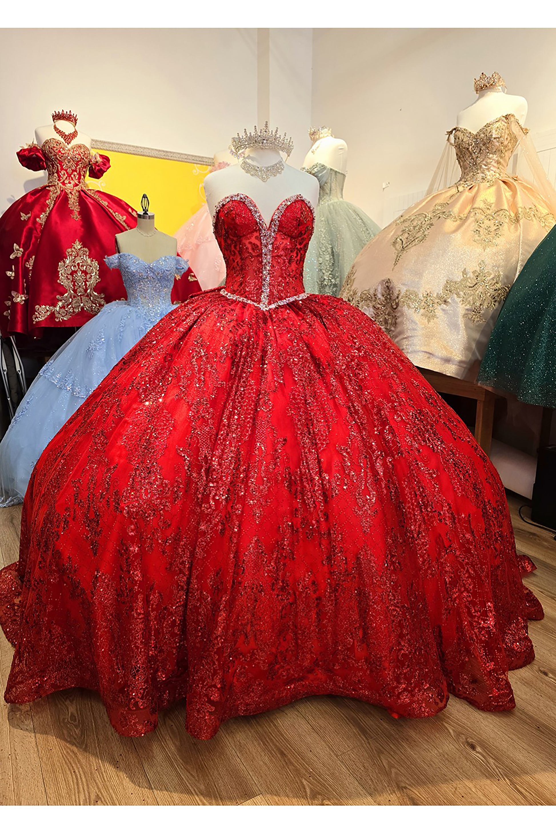 Red Quinceanera | Spackly Sequins and Embellishments See-through Corset Bodice adorned with Shimmering Gems Quince Ballgown - front/side view of dress