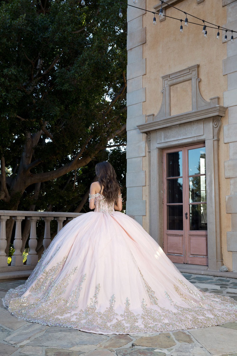 Embroidered Bodice Gems, Rhinestones Sweetheart Neckline with Detachable Long Sleeves and Gold Glitter Details Quince Ballgown back view