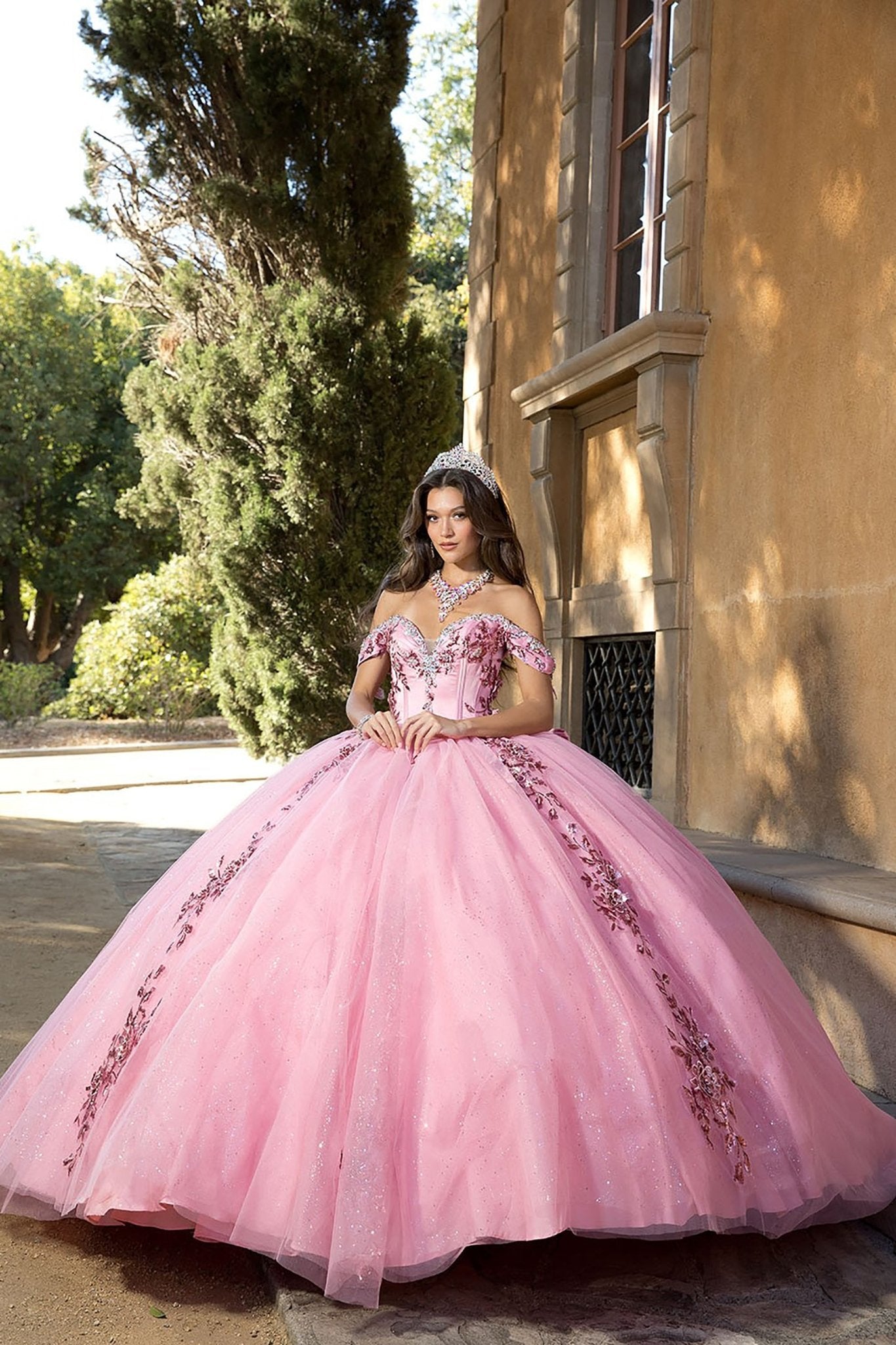 a girl wearing a dusty Rose 3D Floral Appliqué Off-Shoulder Dress with Detachable Bow