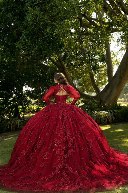 Back view of a red quinceañera dress with lace-up corset, embroidered detailing, detachable bolero and long train