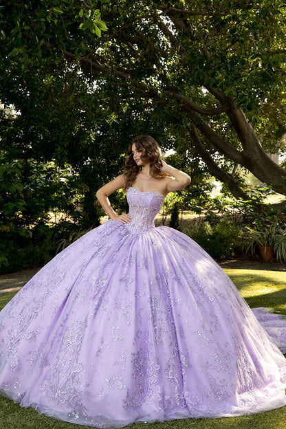 Front view of a woman wearing a lavender quinceañera dress with corset bodice and layered skirt