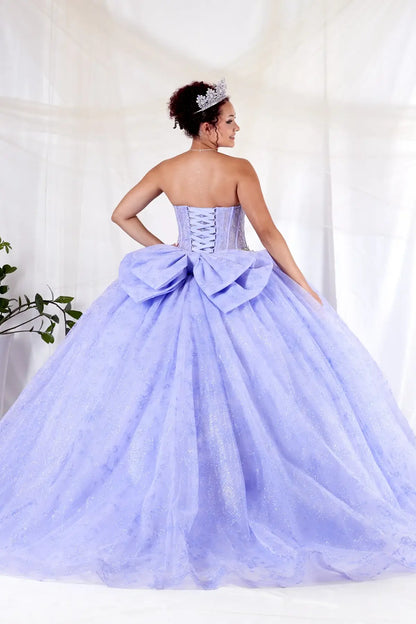 Back-Facing of a woman wearing Lilac formal gown featuring structured back layered skirt and elegant silhouette