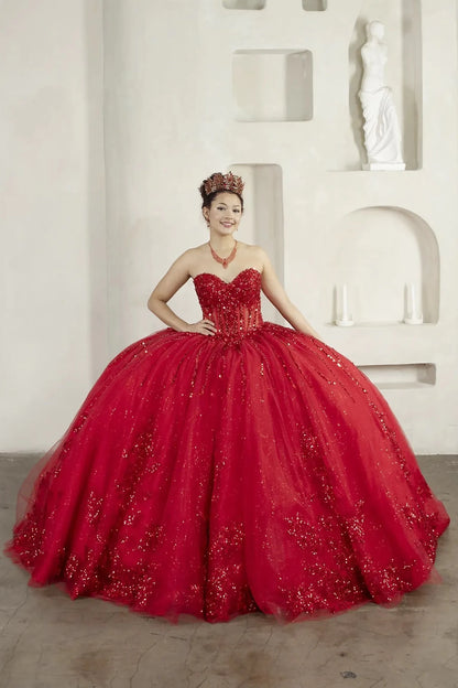 Woman in a red quinceanera ball gown with 3d details on a body and the skirt part  
