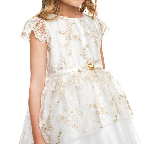 White dress with gold lace details on a white background